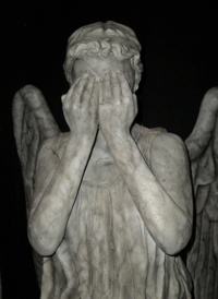 Image of statue of angel hiding