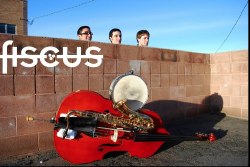Photograph of Fiscus w/ red bass & wall