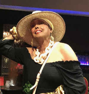 Picture of Jakki Ford in straw hat