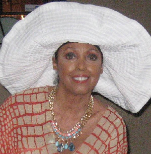 Photograph of Jakki in big white hat