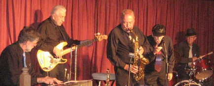 Photograph of the Millennium Bugs at the Mark Twain Cultural Center,
 with Mark Ashworth on drums