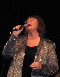 Photograph of Sheryl Adams singing
