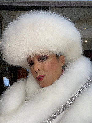 Photo of Jakki in white fur